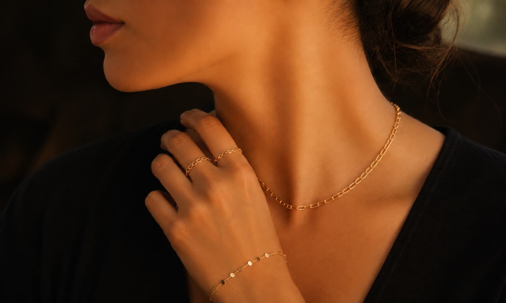 Gold chain jewelry on model
